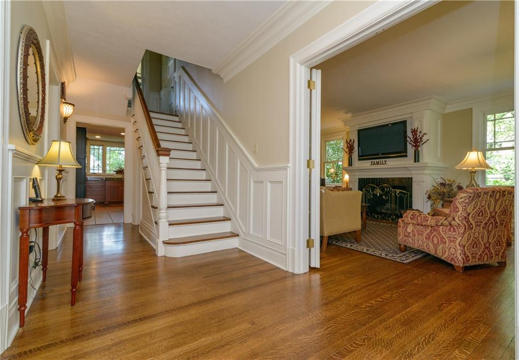 403 Quaker Road Sewickley, PA 15143 - Photo 3 of 24 a view of a livingroom with furniture and a fireplace