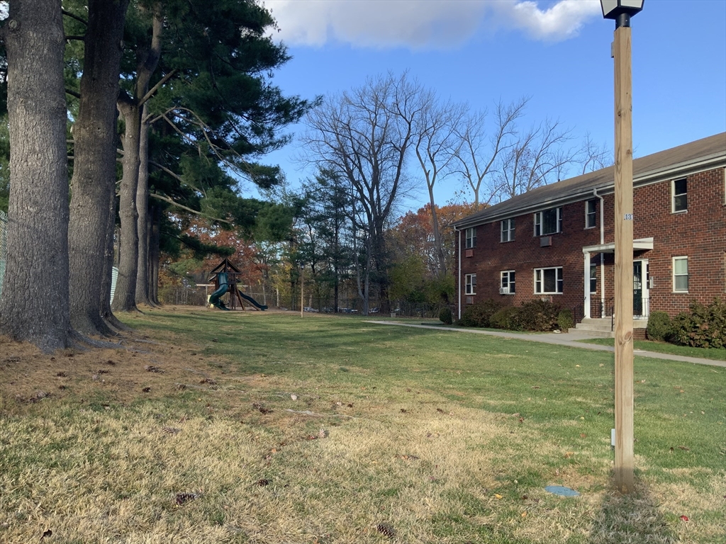 109 Regency Park Drive, Unit 109 Agawam, MA 01001 - Photo 15 of 17 a view of a house with a yard