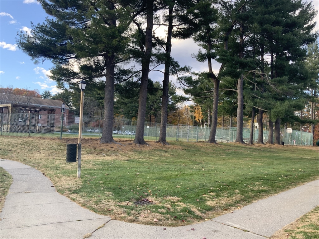 109 Regency Park Drive, Unit 109 Agawam, MA 01001 - Photo 17 of 17 a view of a park with large trees