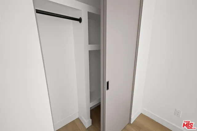 a view of a bathroom from a hallway