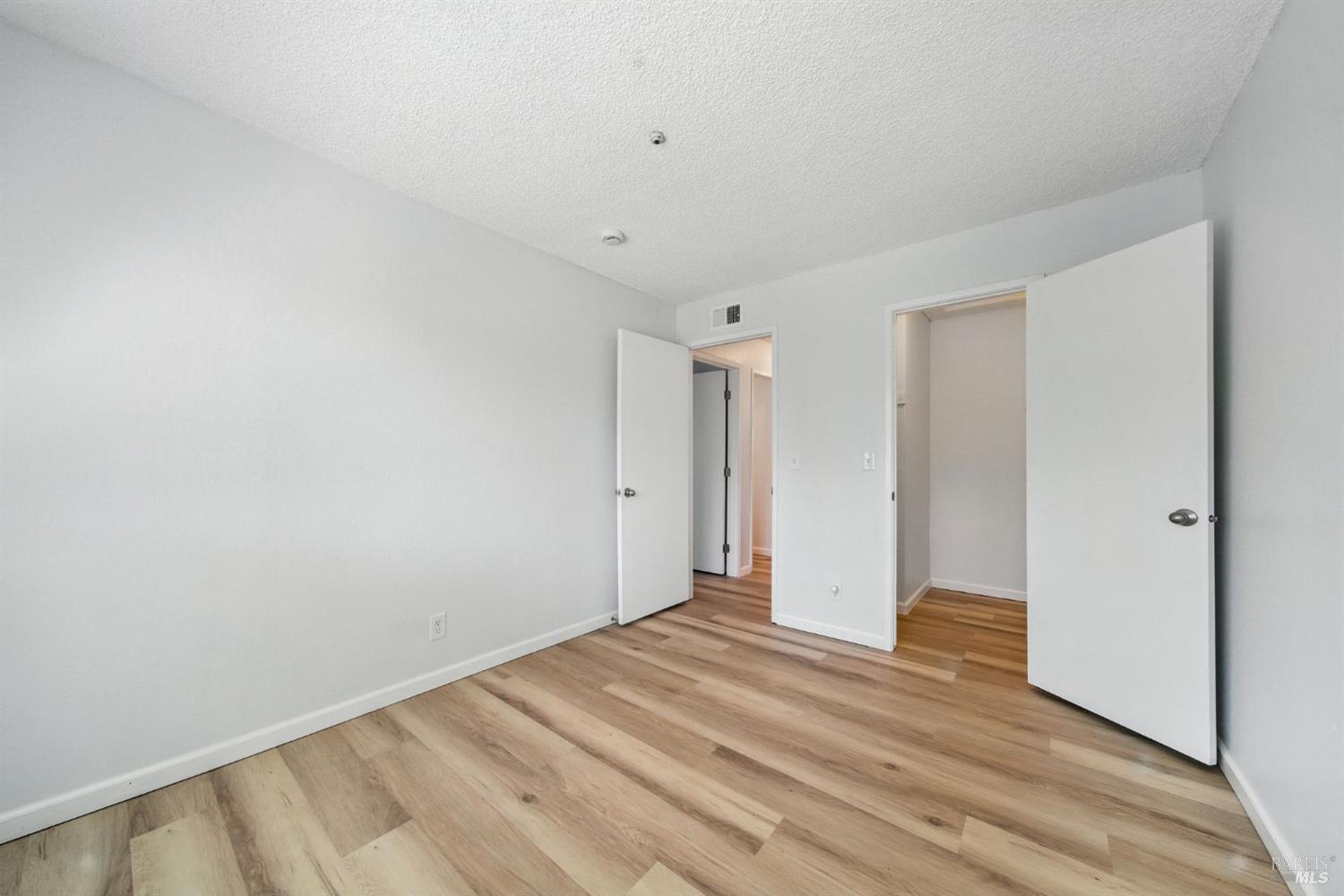 1890 Dorado Court Santa Rosa, CA 95403 - Photo 18 of 28 a view of room with wooden floor