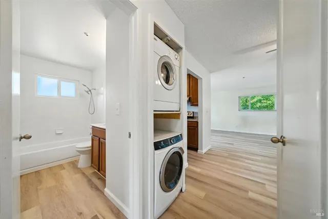 a bathroom with a sink a toilet and a bathtub