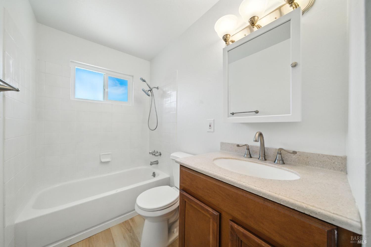 1890 Dorado Court Santa Rosa, CA 95403 - Photo 6 of 28 a bathroom with a sink a toilet and shower