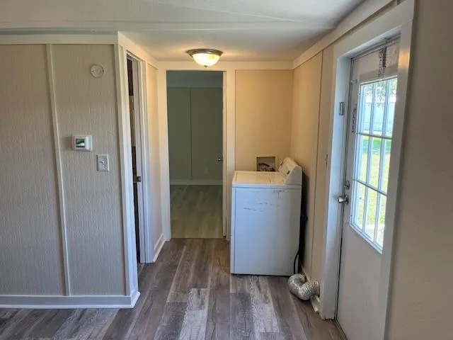 a view of entryway with wooden floor