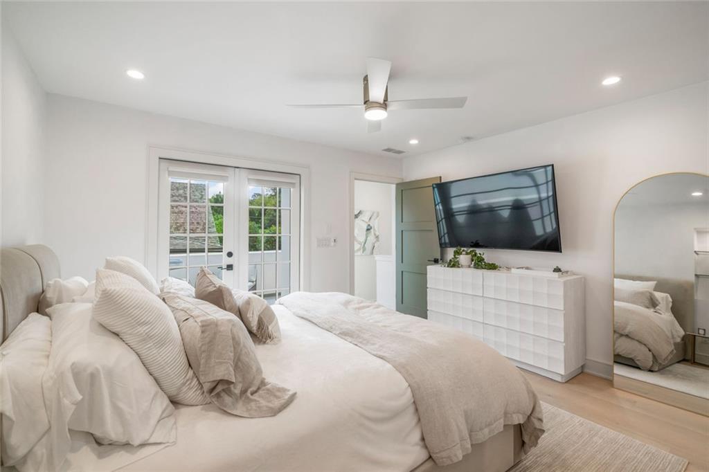 172 High Street Fayetteville, GA 30214 - Photo 12 of 21 a bedroom with a large bed and a flat screen tv