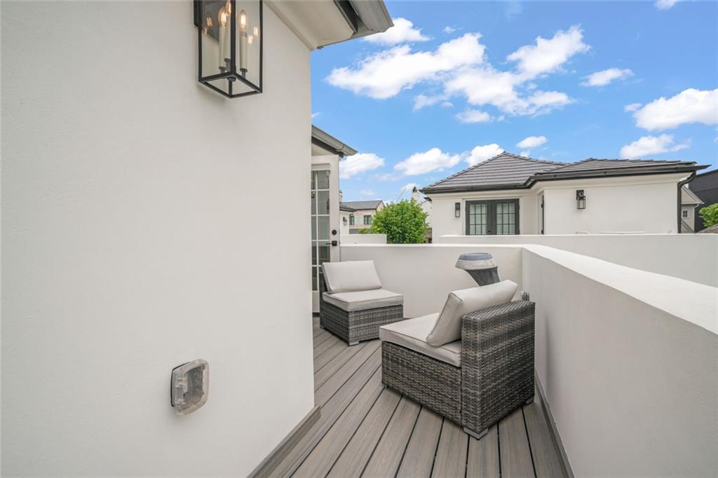 172 High Street Fayetteville, GA 30214 - Photo 10 of 21 a view of a house with a couches and dinning table under an umbrella