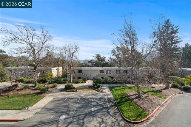 a view of swimming pool patio and outdoor seating