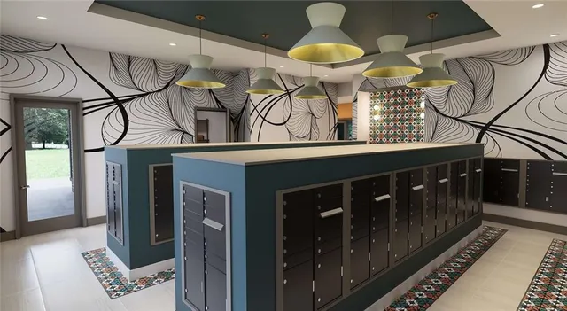 a kitchen with stainless steel appliances a stove a sink and cabinets