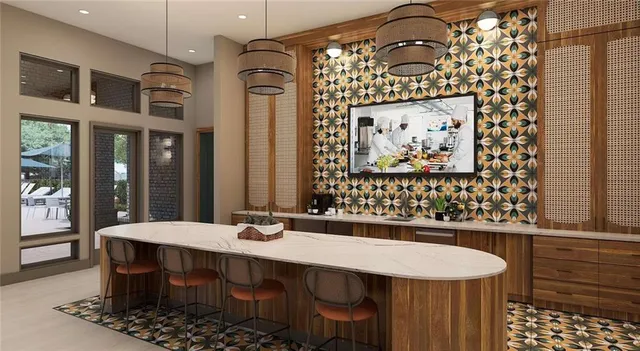 a bathroom with a sink a mirror and a shower