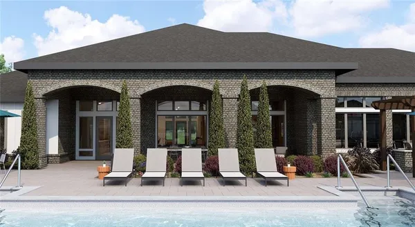 a view of house with outdoor seating space
