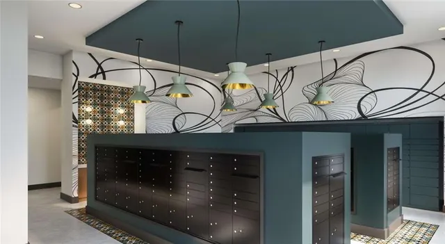 a bathroom with a mirror and a shower