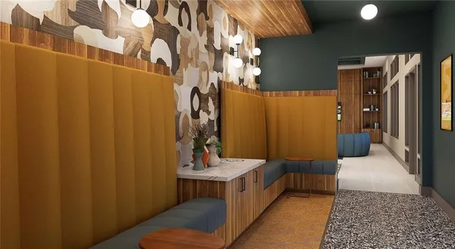 a bathroom with a sink and mirror