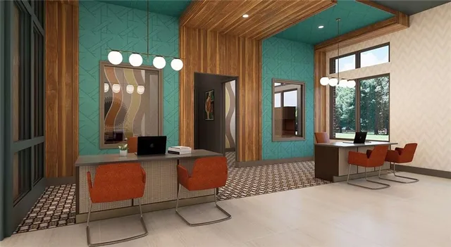 a room with chandelier furniture and a large window