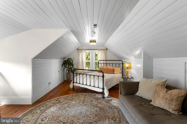 a view of a livingroom with furniture and windows