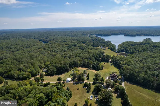 a view of a lake with a yard