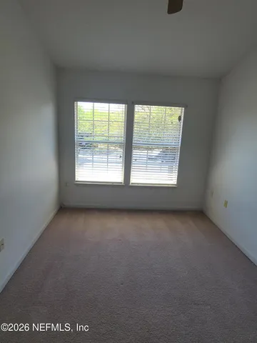 an empty room with a window