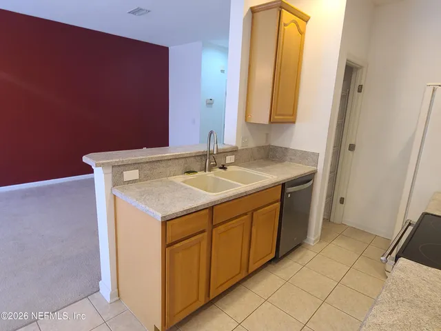 a utility room with a sink