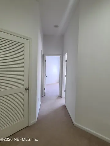 a view of a room with an empty space