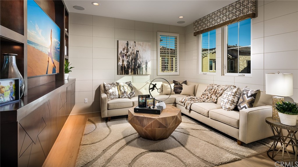 20740 Bur Oak Circle Porter Ranch, CA 91326 - Photo 6 of 10 a living room with furniture and a large window