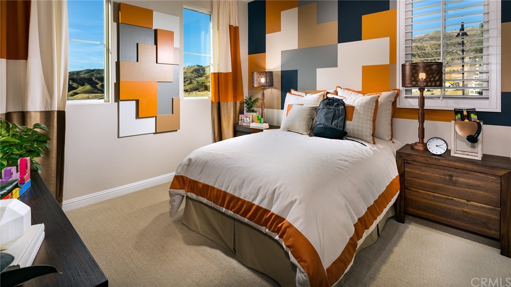 20740 Bur Oak Circle Porter Ranch, CA 91326 - Photo 10 of 10 a bedroom with a bed and wooden floor