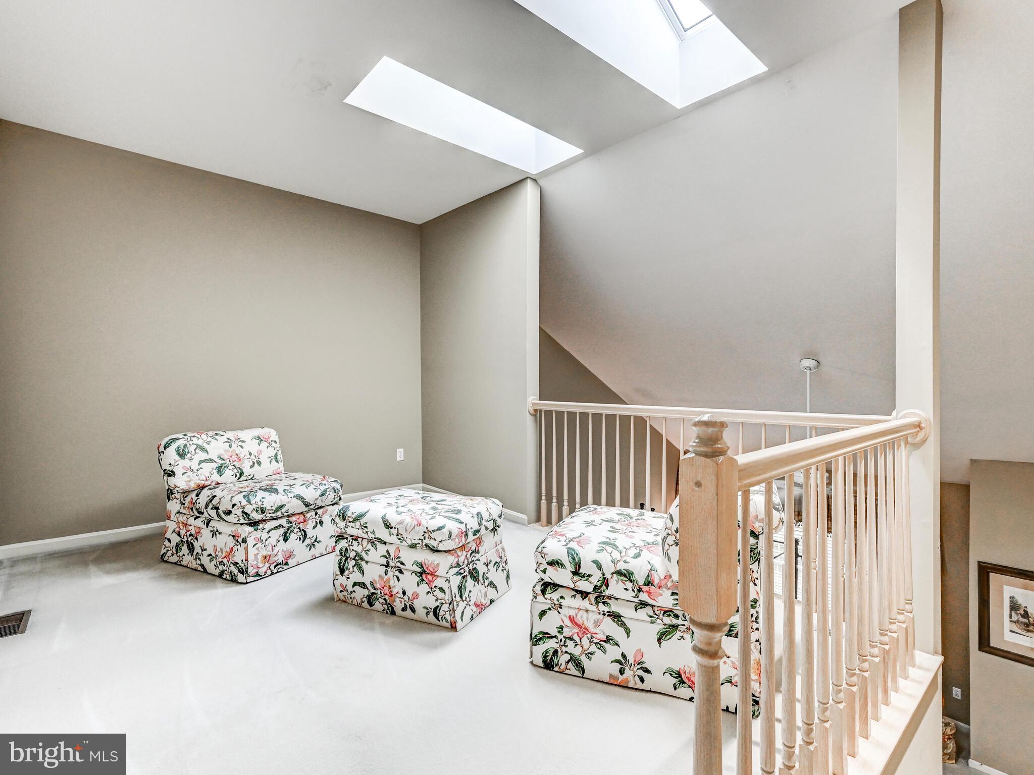 111 River Oaks Circle Baltimore, MD 21208 - Photo 24 of 35 a bedroom with three beds and a baby crib