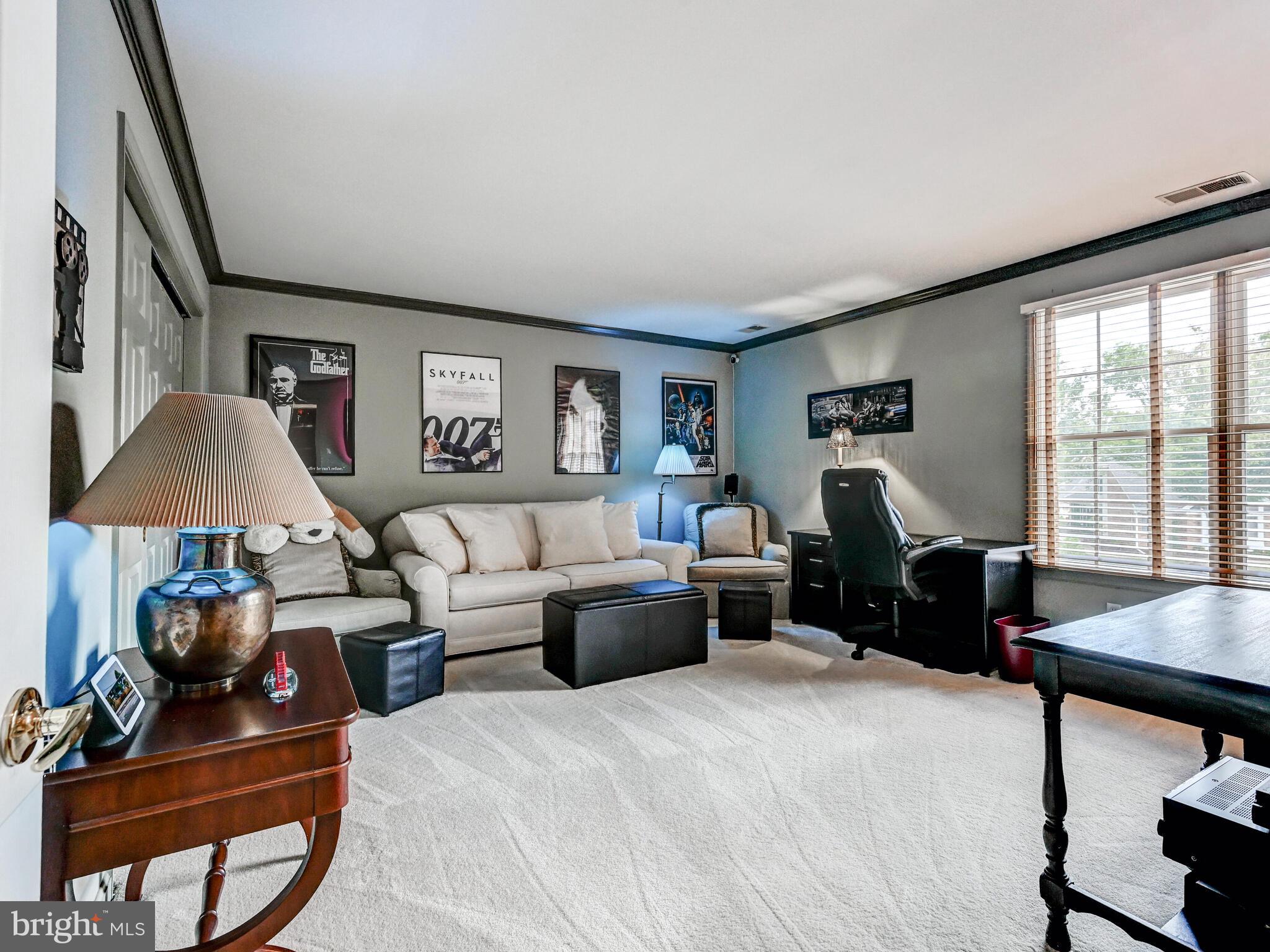 111 River Oaks Circle Baltimore, MD 21208 - Photo 27 of 35 a bed room with furniture and a window