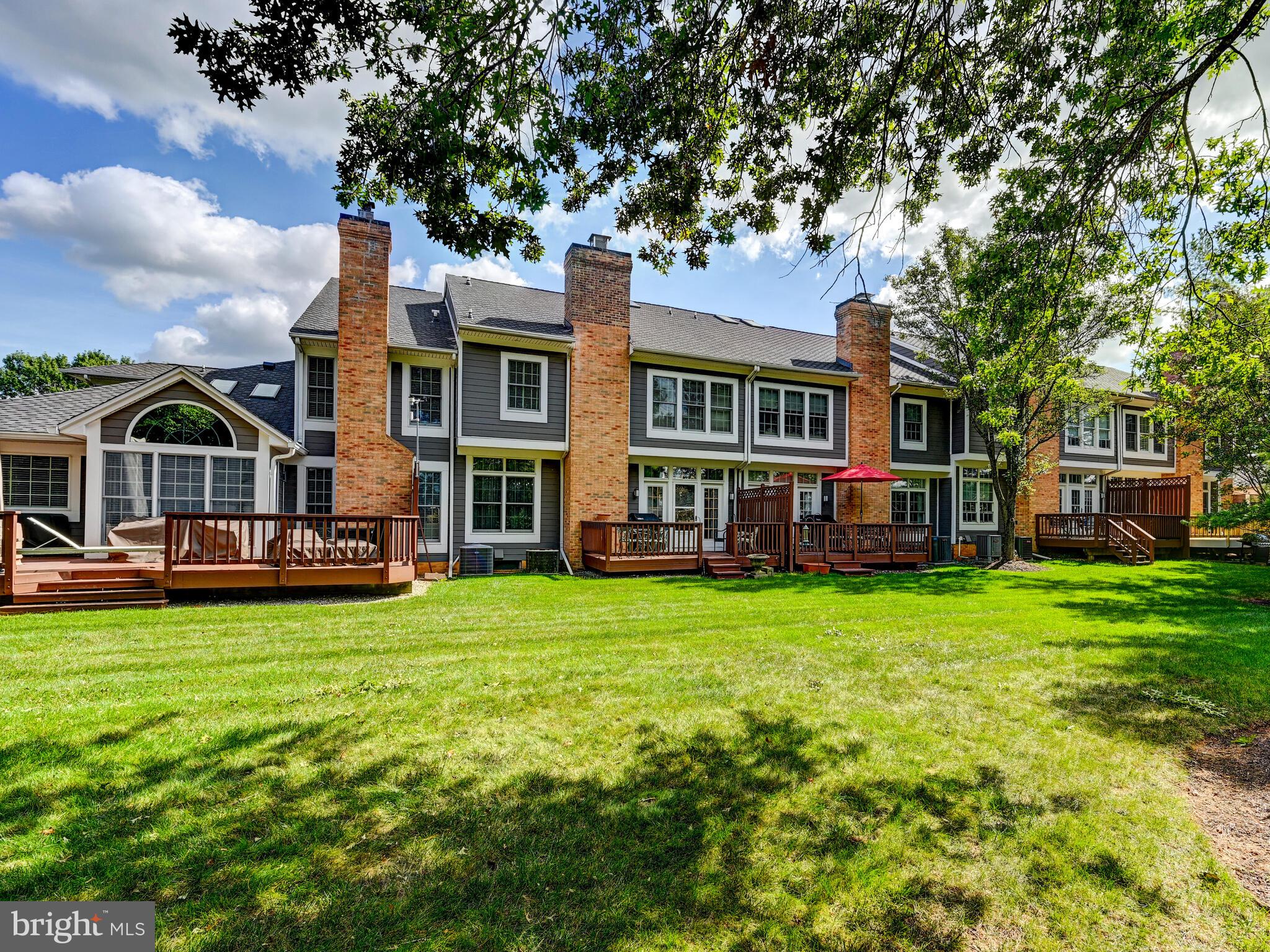 111 River Oaks Circle Baltimore, MD 21208 - Photo 33 of 35 a view of a house with a big yard plants and large trees