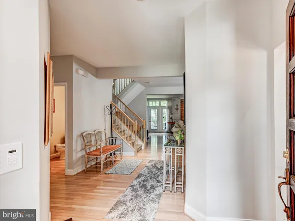 a view of an entryway and livingroom