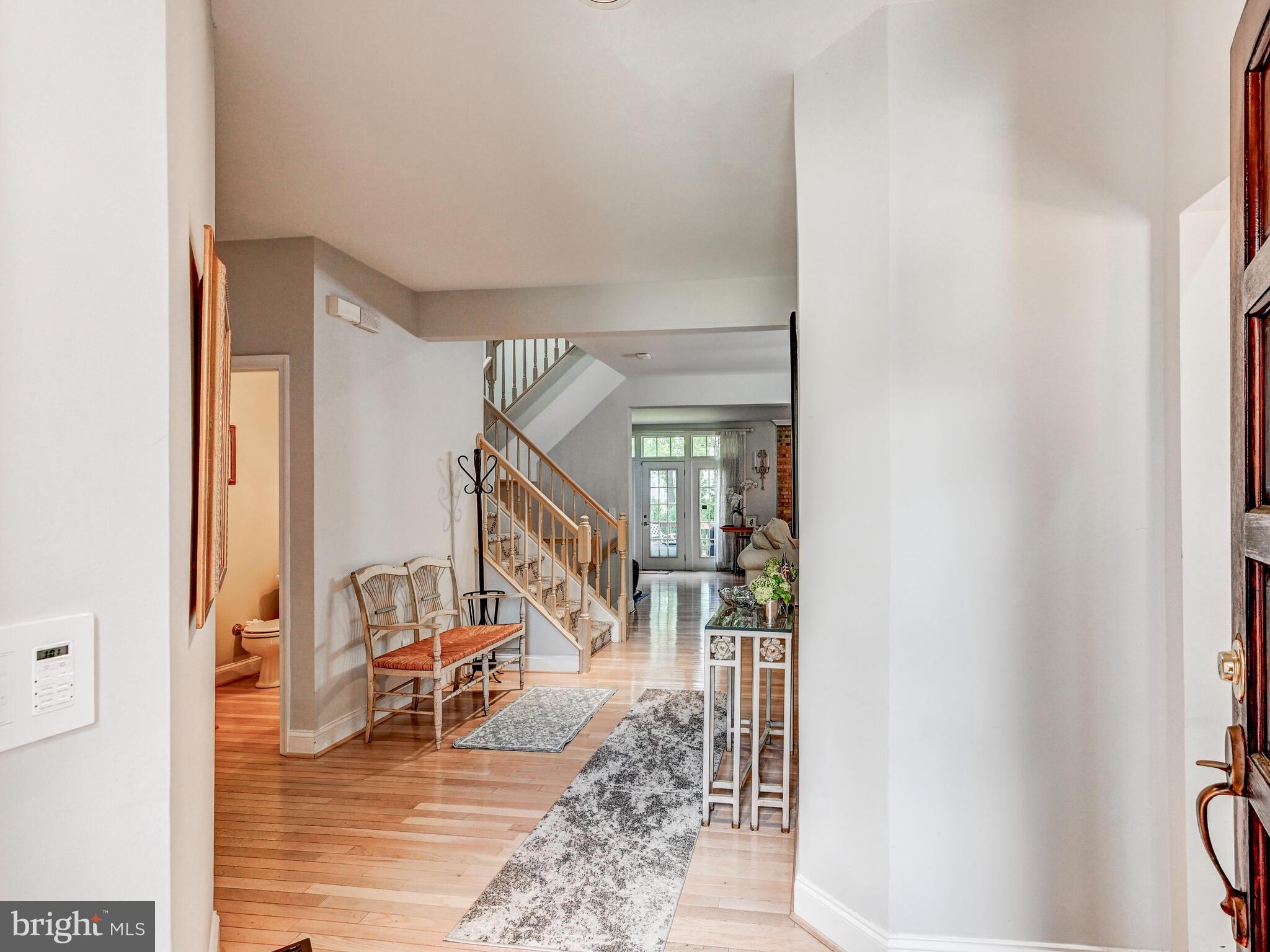 111 River Oaks Circle Baltimore, MD 21208 - Photo 4 of 35 a view of an entryway and livingroom