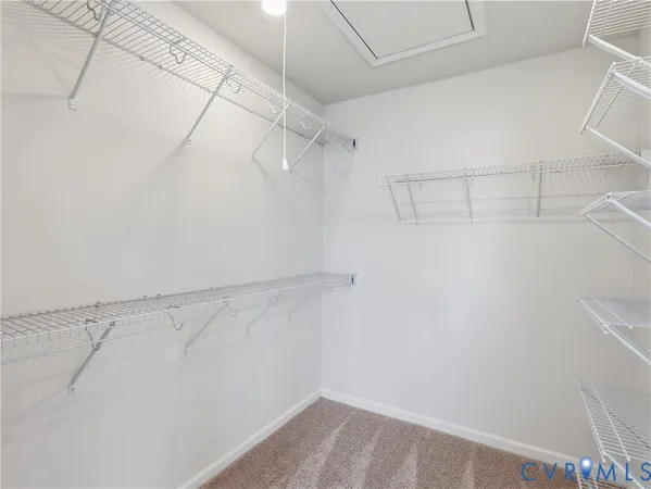 a view of a room with racks on the wall