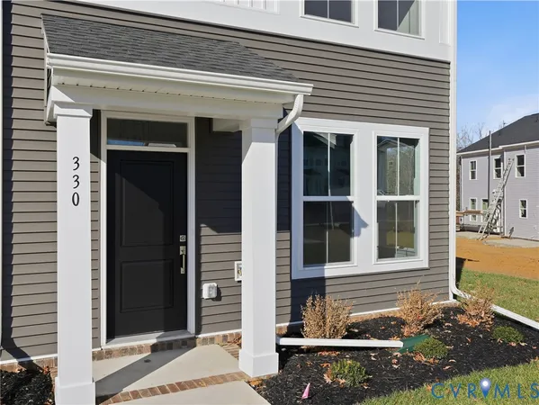 a front view of a house with a garage