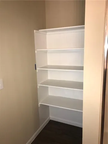 a view of small space with racks on the wall