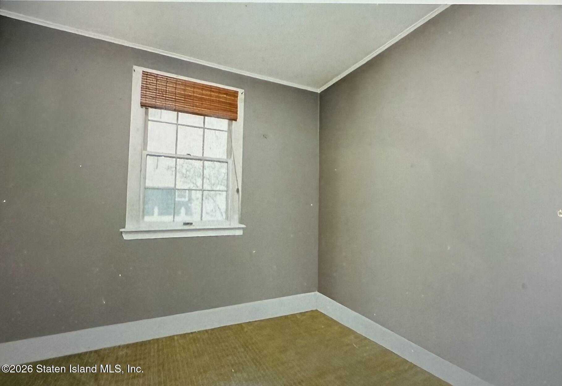 111 David Street Staten Island, NY 10308 - Photo 16 of 38 an empty room with a window