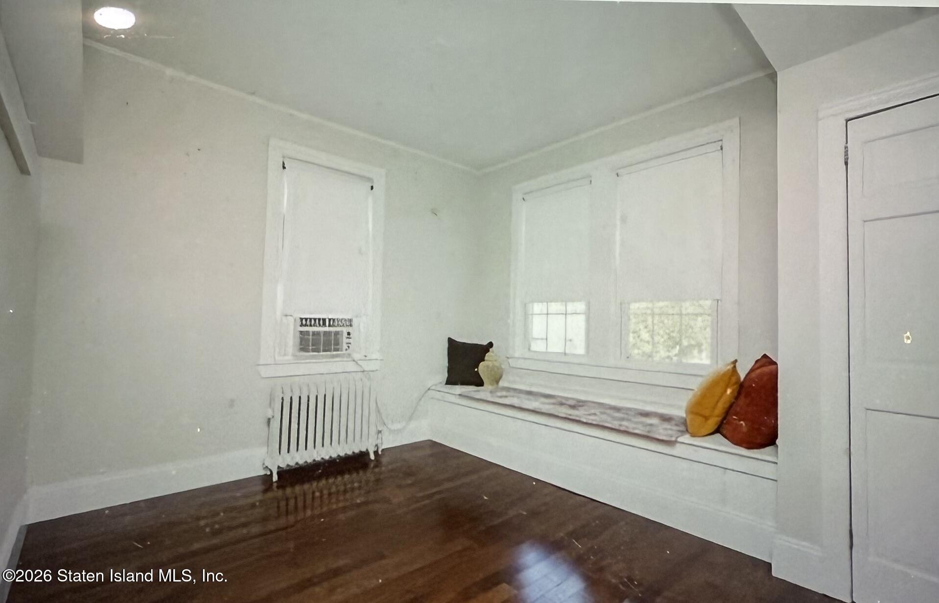 111 David Street Staten Island, NY 10308 - Photo 17 of 38 a bedroom with a bed and a window