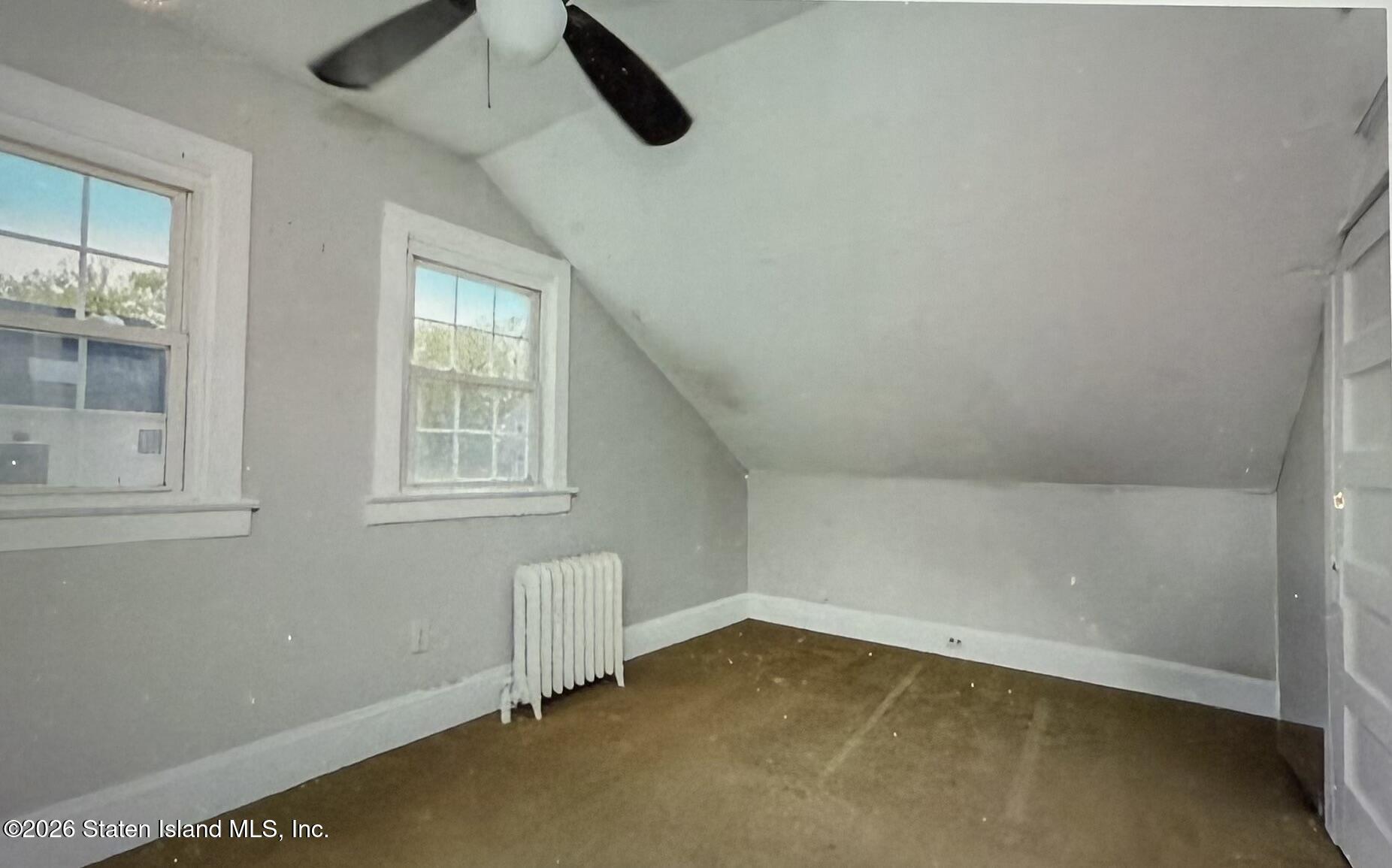 111 David Street Staten Island, NY 10308 - Photo 23 of 38 an empty room with a empty space and windows