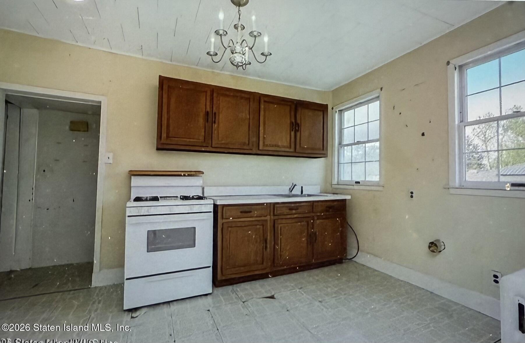 111 David Street Staten Island, NY 10308 - Photo 24 of 38 a kitchen with a stove and a sink