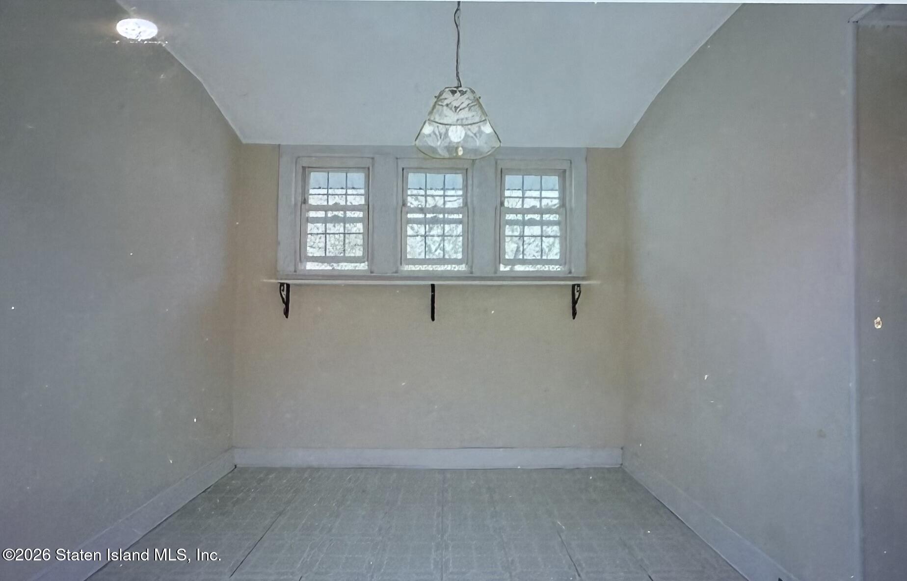 111 David Street Staten Island, NY 10308 - Photo 26 of 38 a view of an empty room with a window