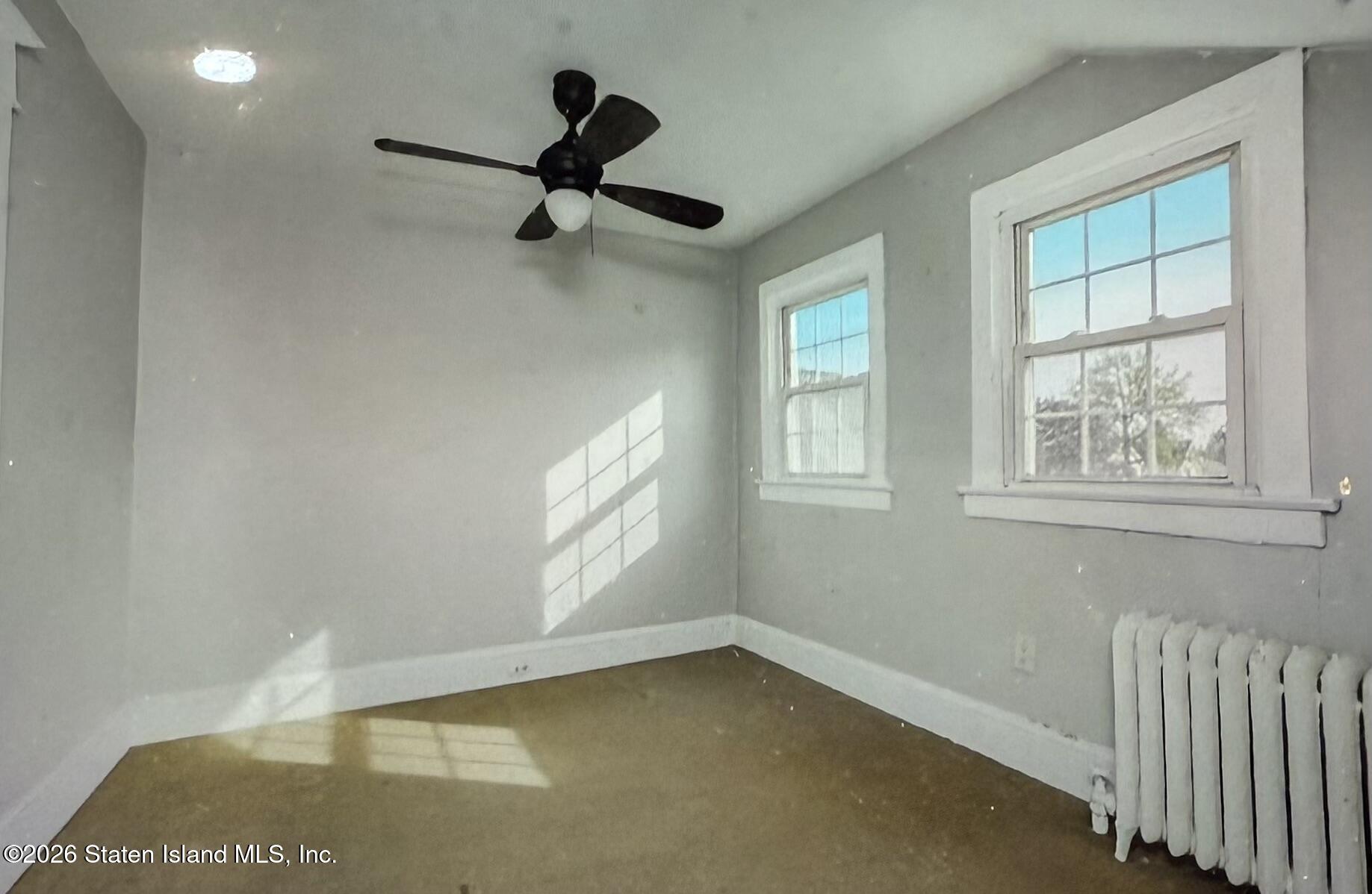 111 David Street Staten Island, NY 10308 - Photo 28 of 38 a view of empty room with windows