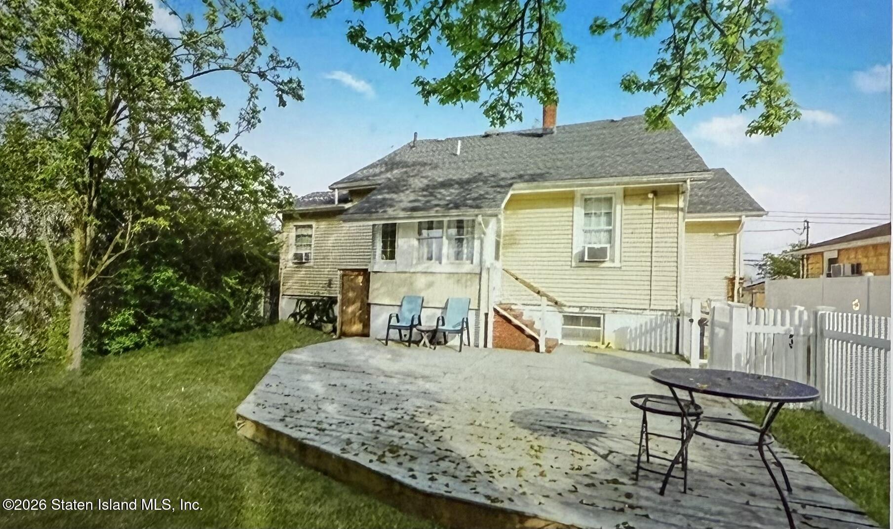 111 David Street Staten Island, NY 10308 - Photo 33 of 38 an outdoor view of house with backyard space and garden