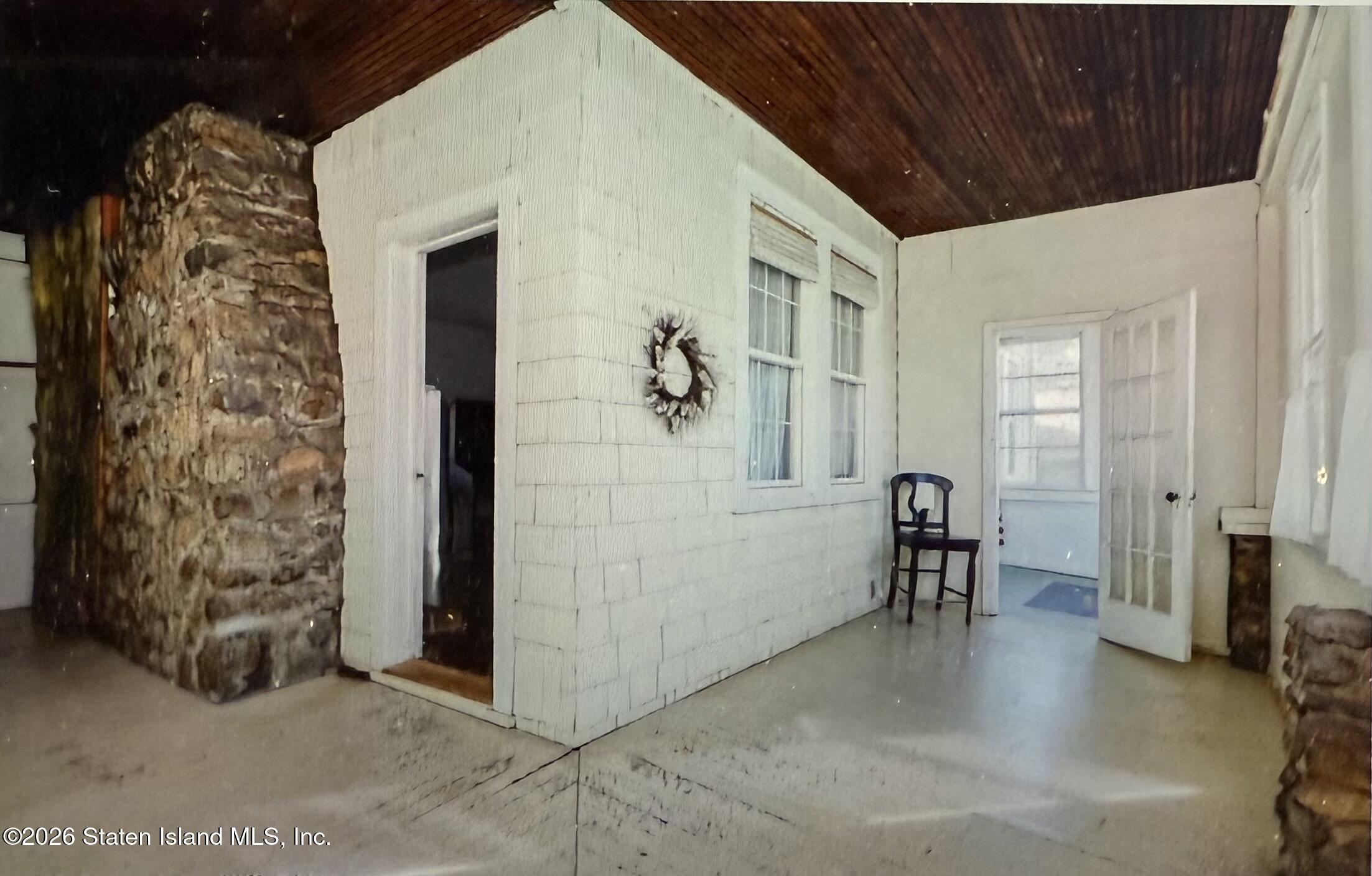 111 David Street Staten Island, NY 10308 - Photo 6 of 38 a view of a hallway with seating area