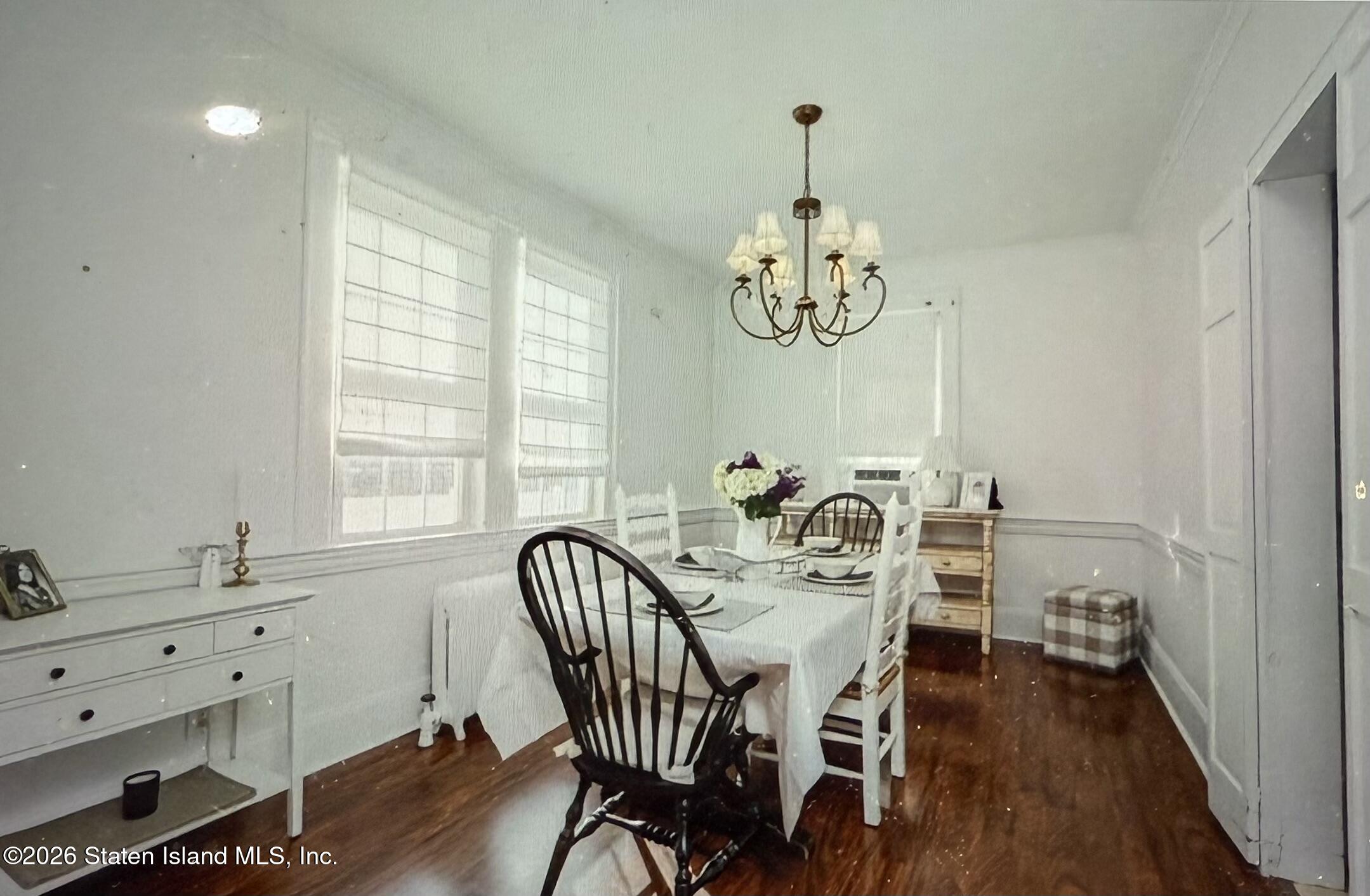 111 David Street Staten Island, NY 10308 - Photo 9 of 38 a view of a dining room with furniture window and wooden floor
