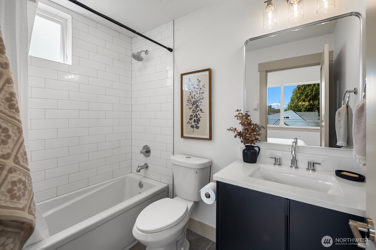 2931 39th Avenue Southwest Seattle, WA 98116 - Photo 20 of 40 a bathroom with a sink a toilet and shower