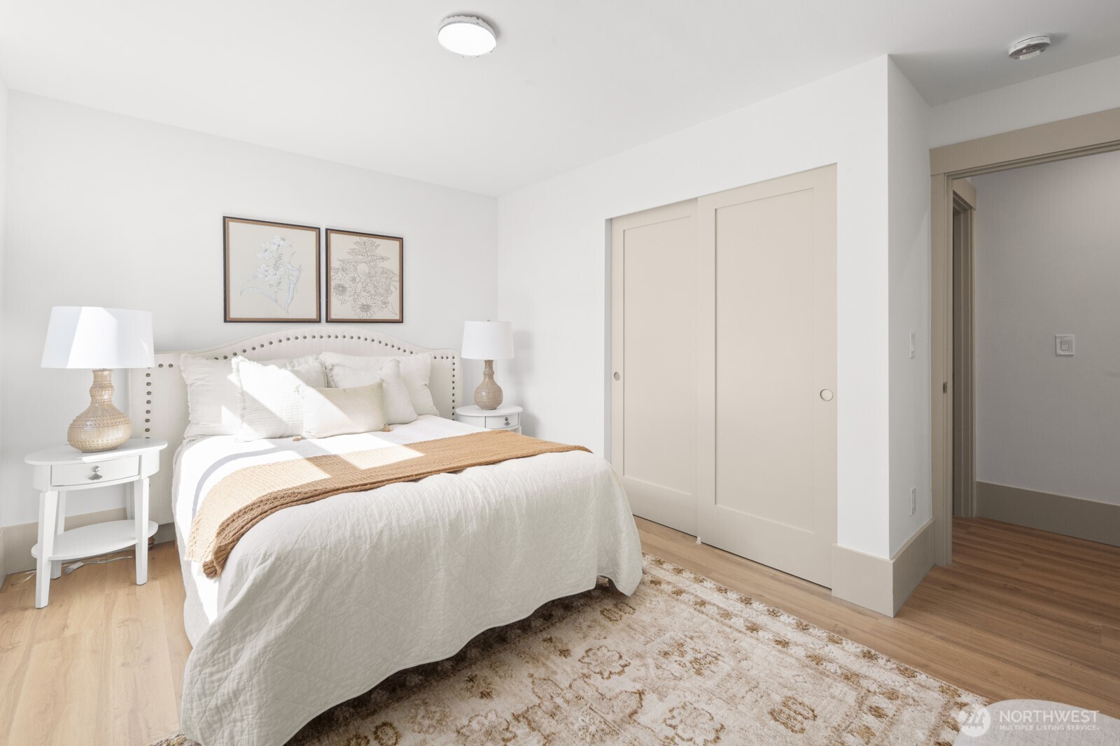 2931 39th Avenue Southwest Seattle, WA 98116 - Photo 25 of 40 a bedroom with a bed and a mirror