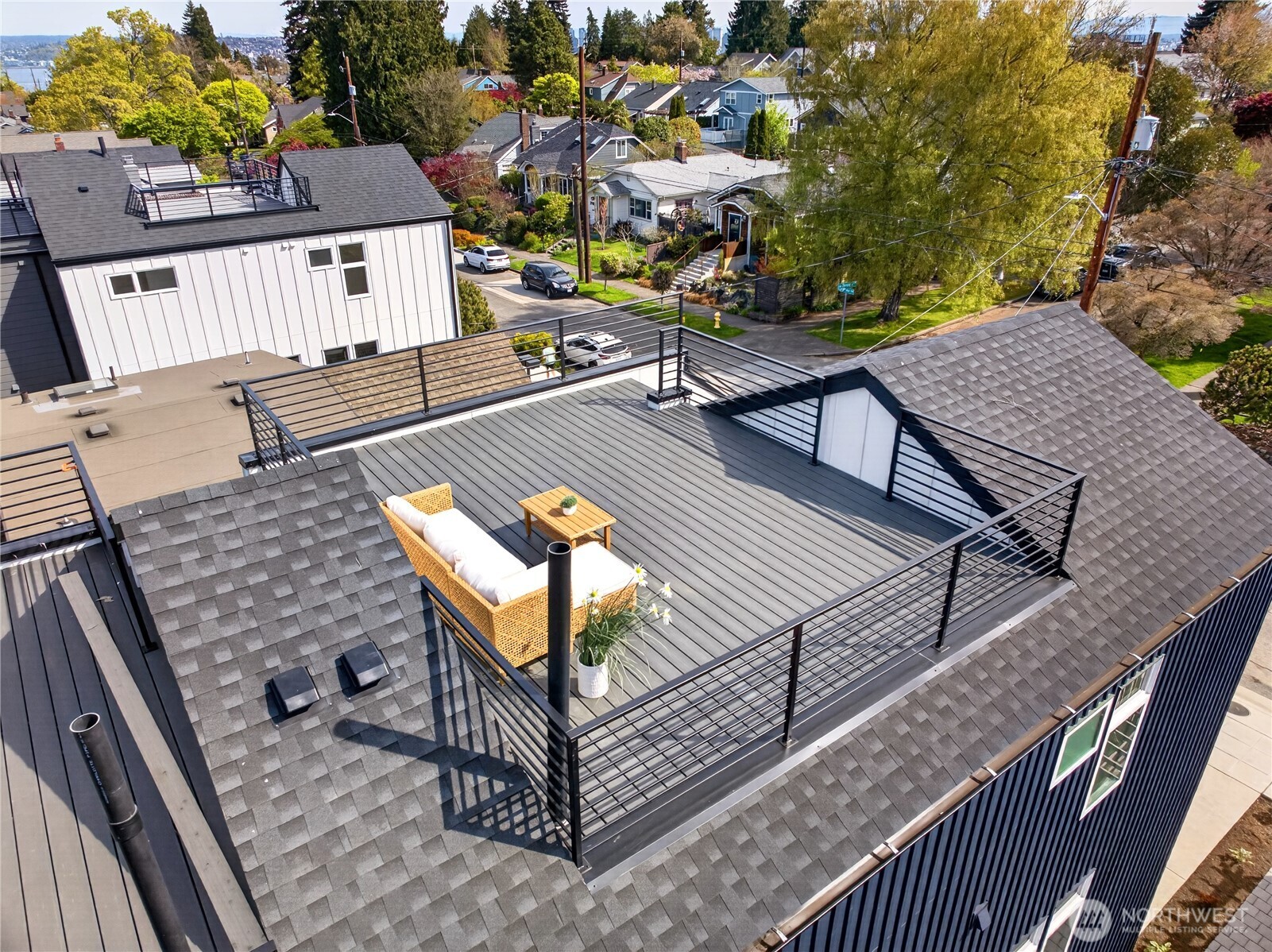 2931 39th Avenue Southwest Seattle, WA 98116 - Photo 30 of 40 a view of a balcony with chairs
