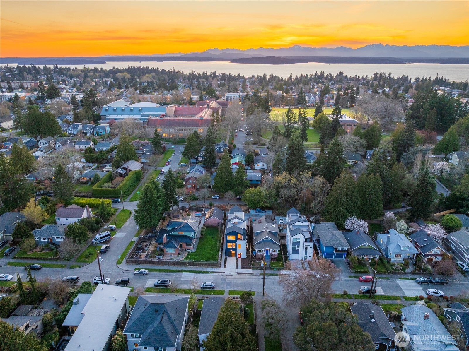 2931 39th Avenue Southwest Seattle, WA 98116 - Photo 35 of 40 an aerial view of residential houses with outdoor space and swimming pool