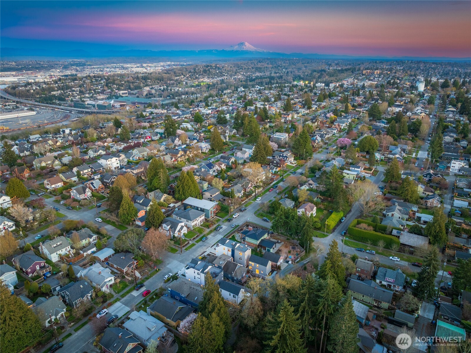 2931 39th Avenue Southwest Seattle, WA 98116 - Photo 37 of 40 an aerial view of residential houses with city view