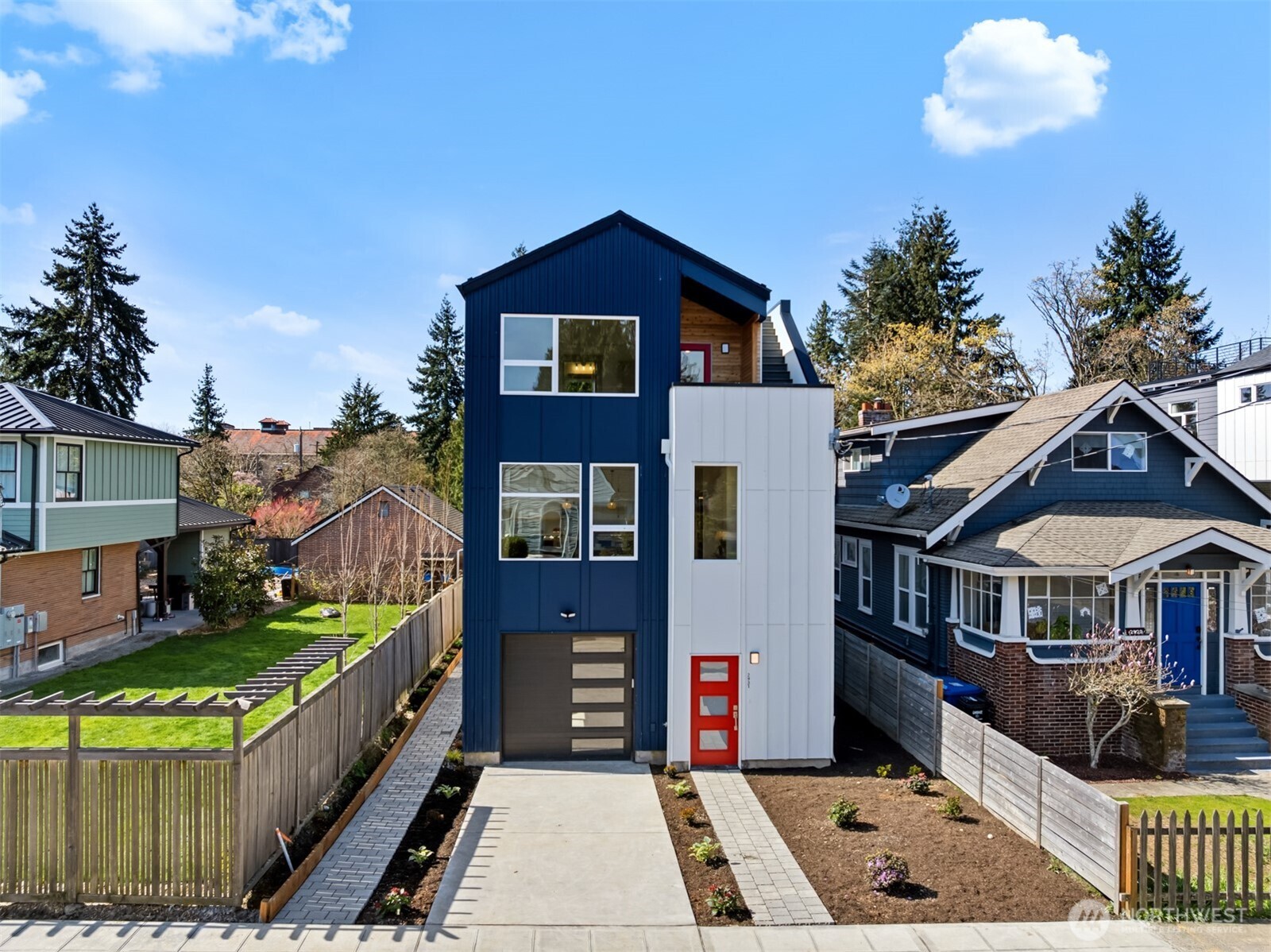 2931 39th Avenue Southwest Seattle, WA 98116 - Photo 40 of 40 a front view of a house with a yard