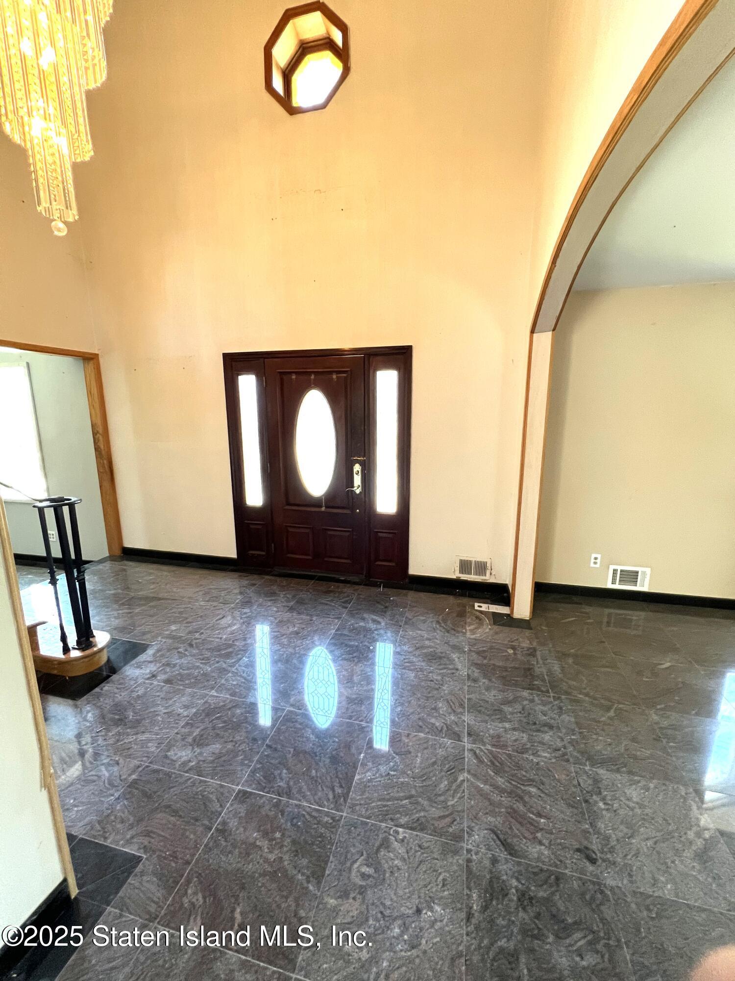 85 Foster Road Staten Island, NY 10309 - Photo 15 of 34 a view of a livingroom with wooden floor