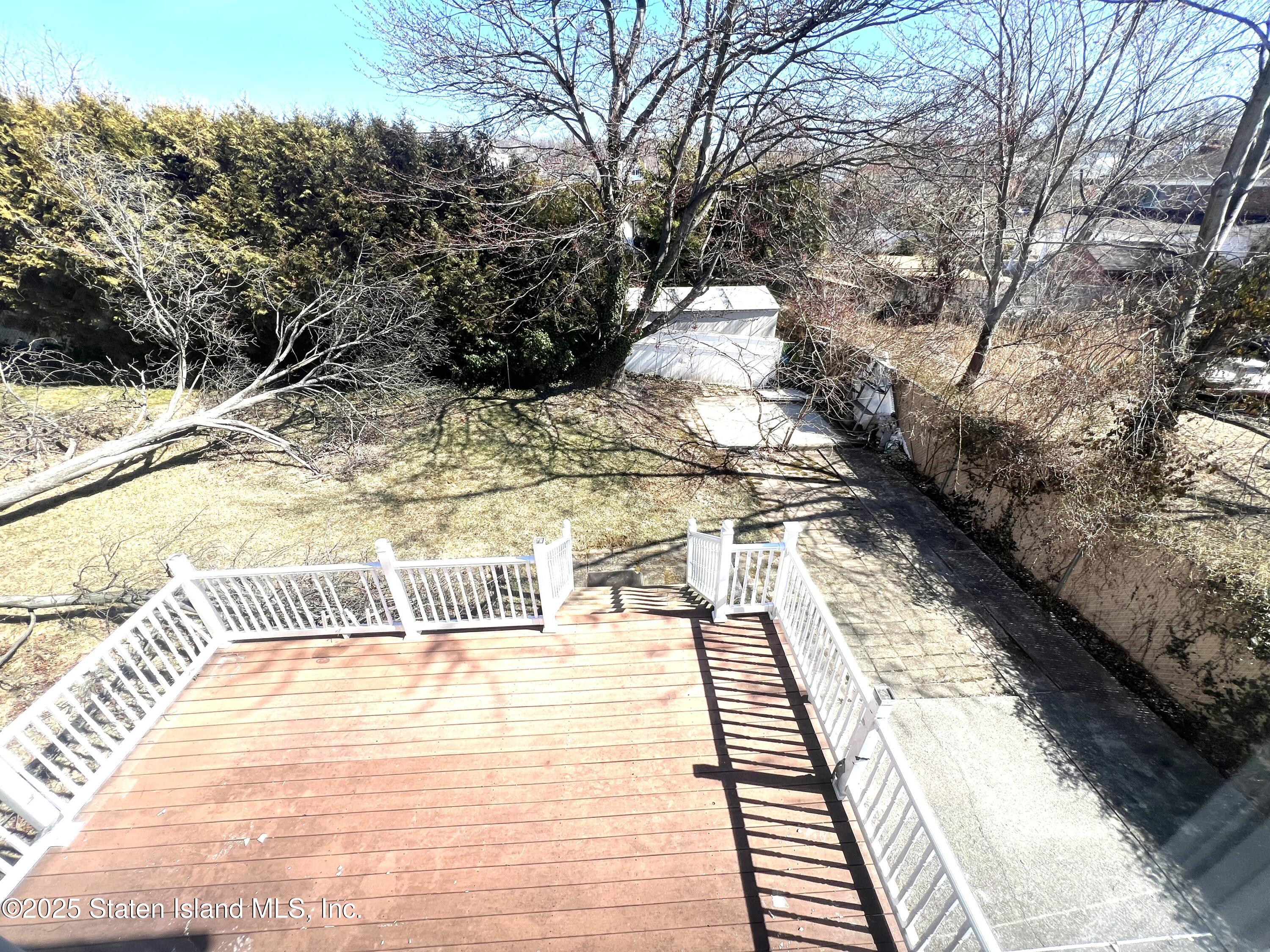 85 Foster Road Staten Island, NY 10309 - Photo 33 of 34 a view of a yard with wooden fence