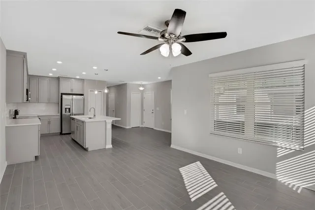 a view of kitchen and windows